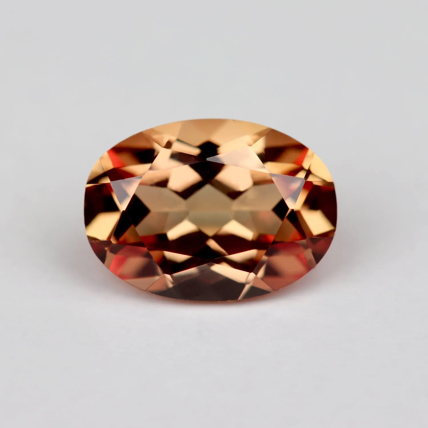 7x5mm Oval Lab-grown Orange Sapphire - 115075