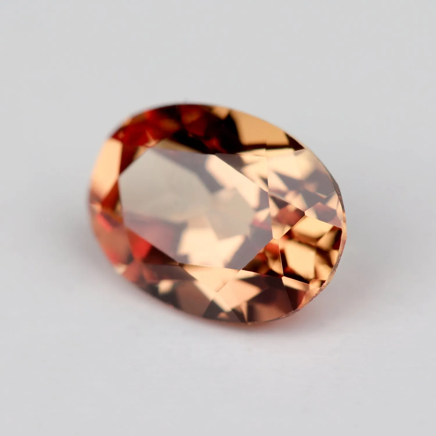 7x5mm Oval Lab-grown Orange Sapphire - 115075
