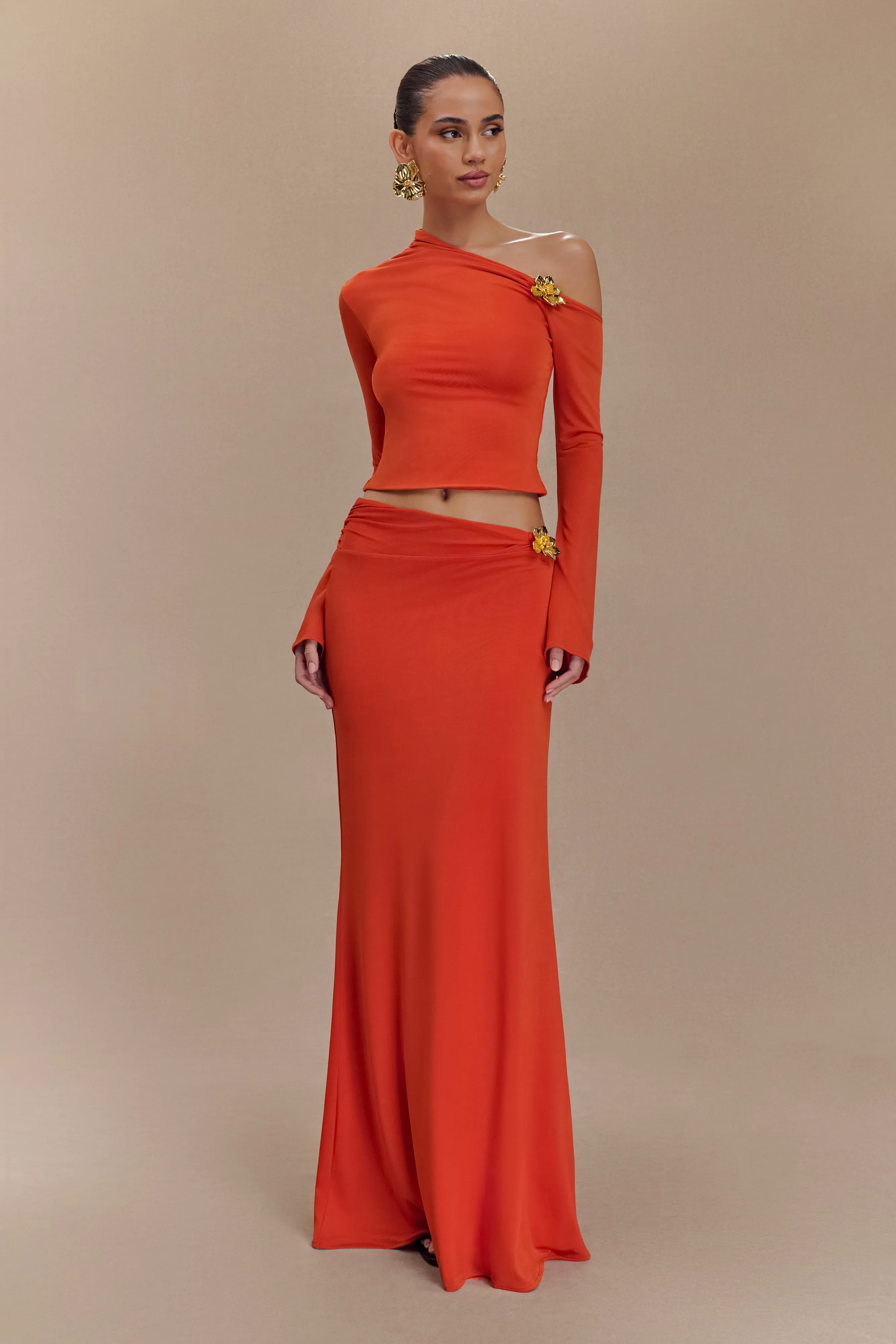 Ainsley Burnt Orange Asymmetrical Long Sleeve Top with Floral Detailing