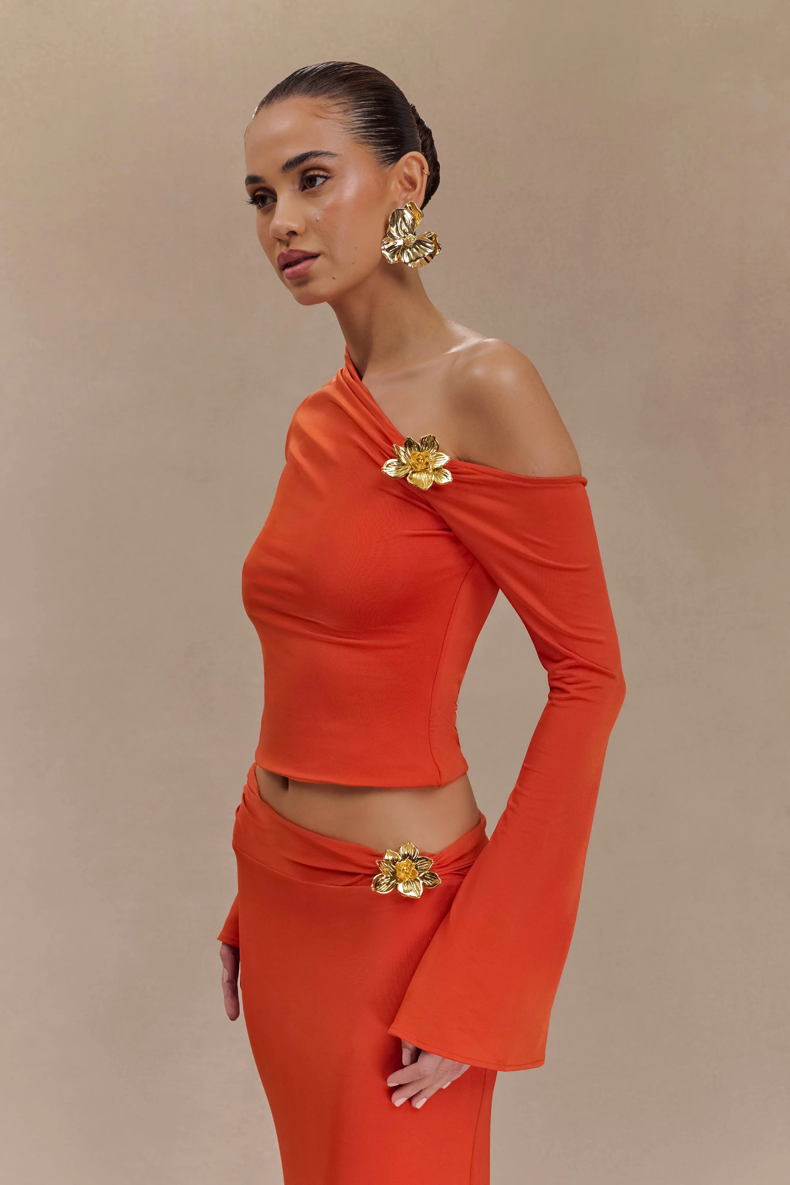 Ainsley Burnt Orange Asymmetrical Long Sleeve Top with Floral Detailing
