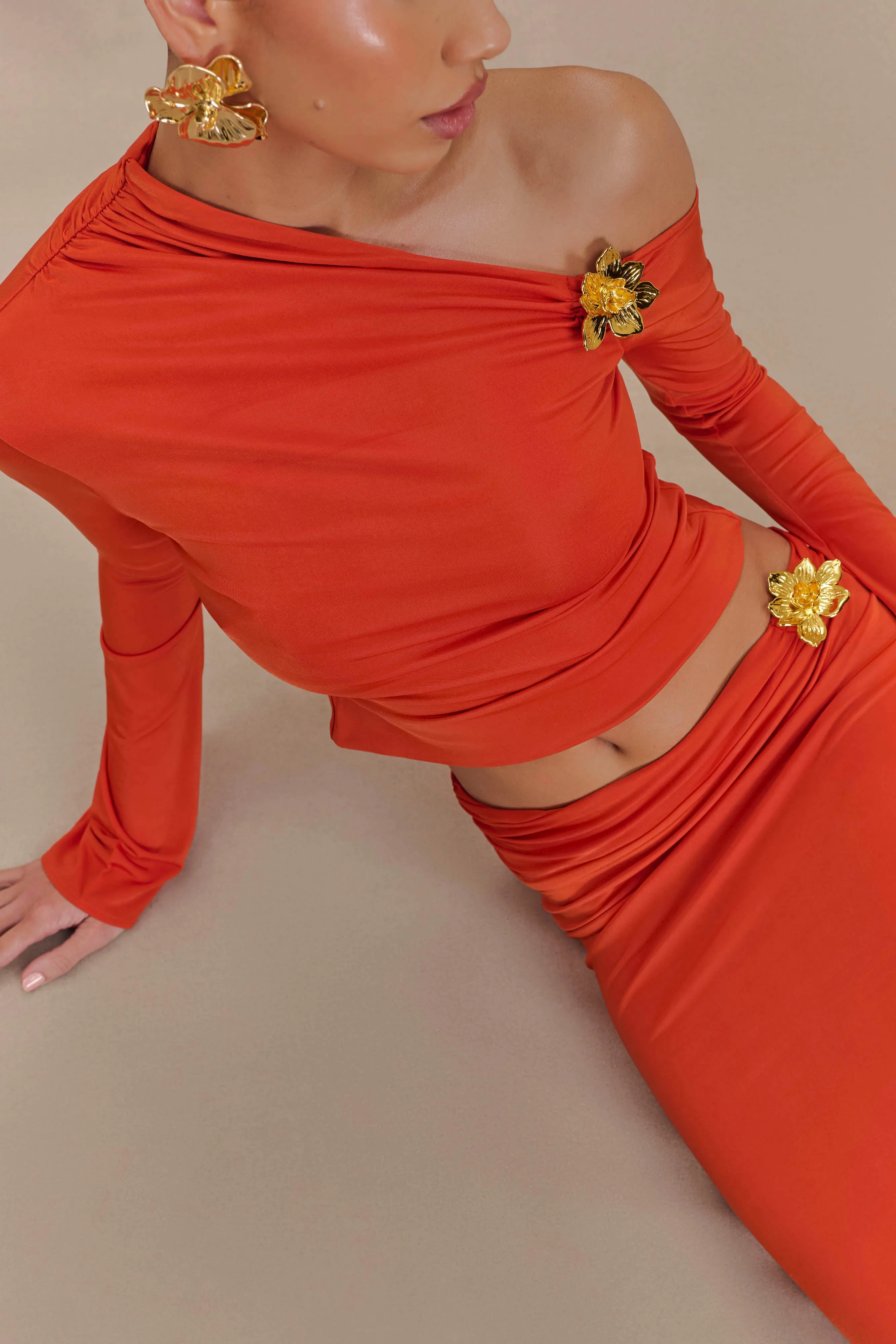 Ainsley Burnt Orange Asymmetrical Long Sleeve Top with Floral Detailing