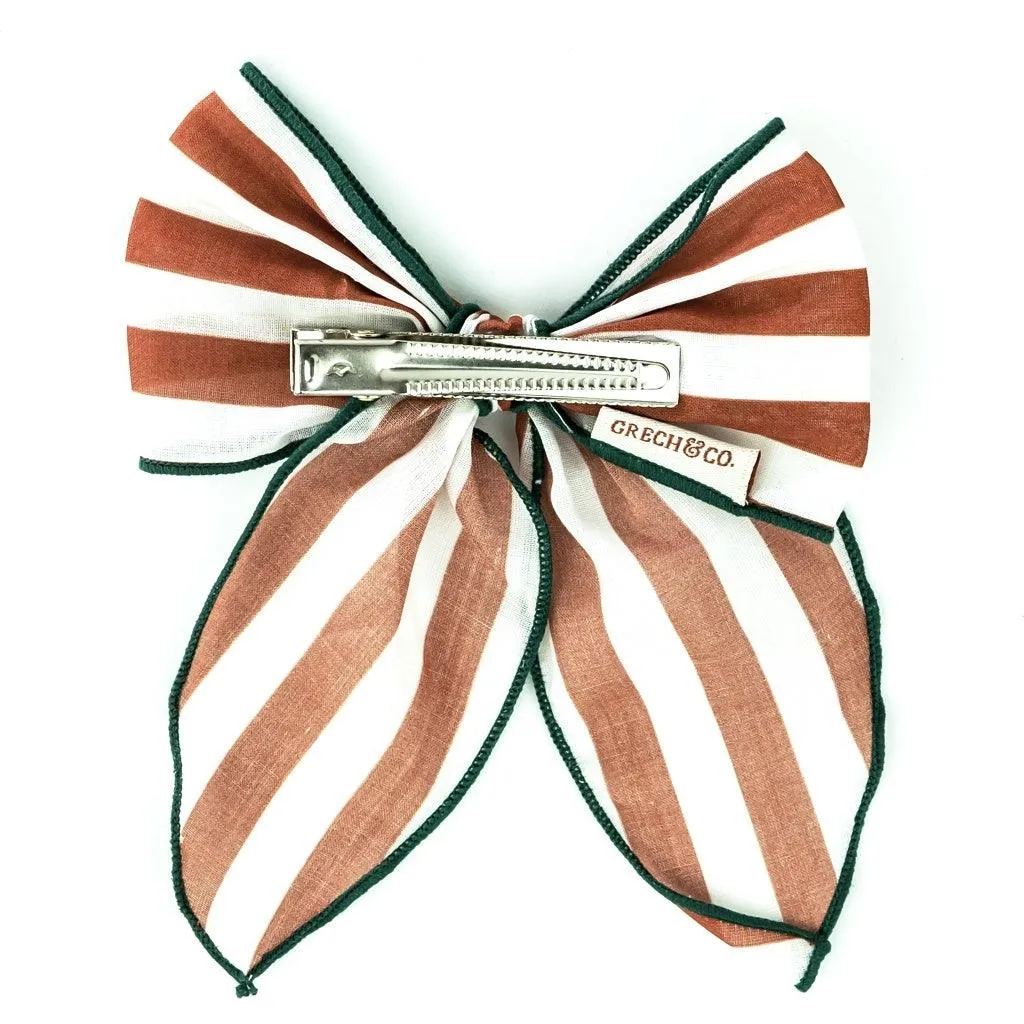 Mid-Size Fable Bow in Striped Atlas and Tierra Pattern